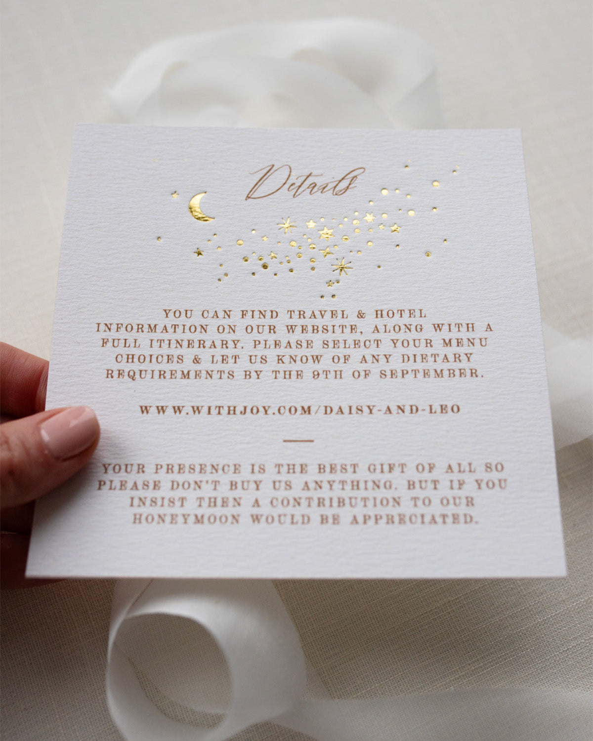 Celestial themed wedding details card. A truly magical design made up of lots of little stars is hot foiled in gold on to thick textured card. Styled with silk ribbon. FancyFolk Design