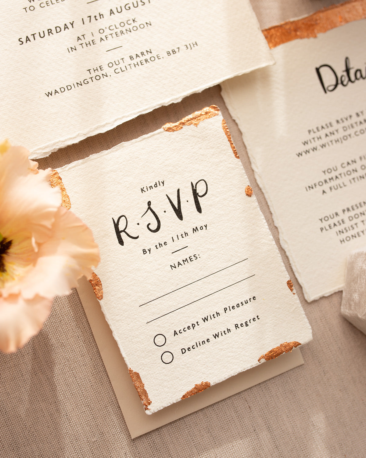 Modern Calligraphy Wedding RSVP with neutral almond coloured envelopes. Our wedding stationery is printed on textured handmade Indian paper with hand torn edges for a soft romantic feel. Each piece is lovingly hand finished with copper leaf for a luxury feel. Fancy Folk