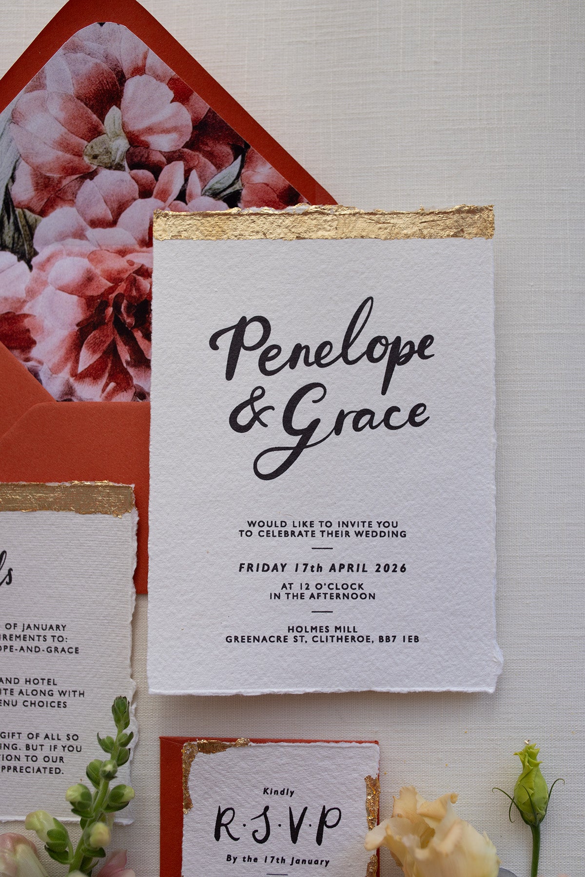 Super shiny gold leaf finish on our Modern Calligraphy Wedding Invitations. Styled with terracotta envelopes and floral envelope liners. Handmade on Indian paper with hand torn romantic edges. Fancy Folk