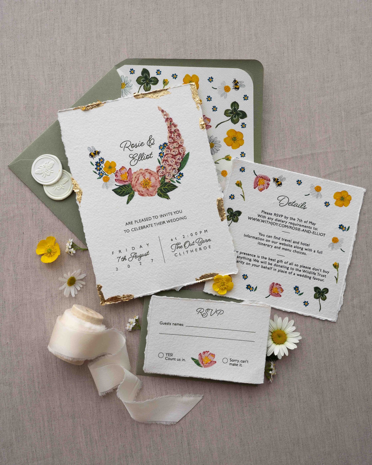 Watercolour hand painted florals of meadow flowers and a little bee make up a posy. Couples names are nestled in the floral. Printed on handmade Indian cotton paper with gold leaf accent. Styled with white bee wax seals, floral envelope liners and silk ribbon. Sage green envelopes and fresh flowers.