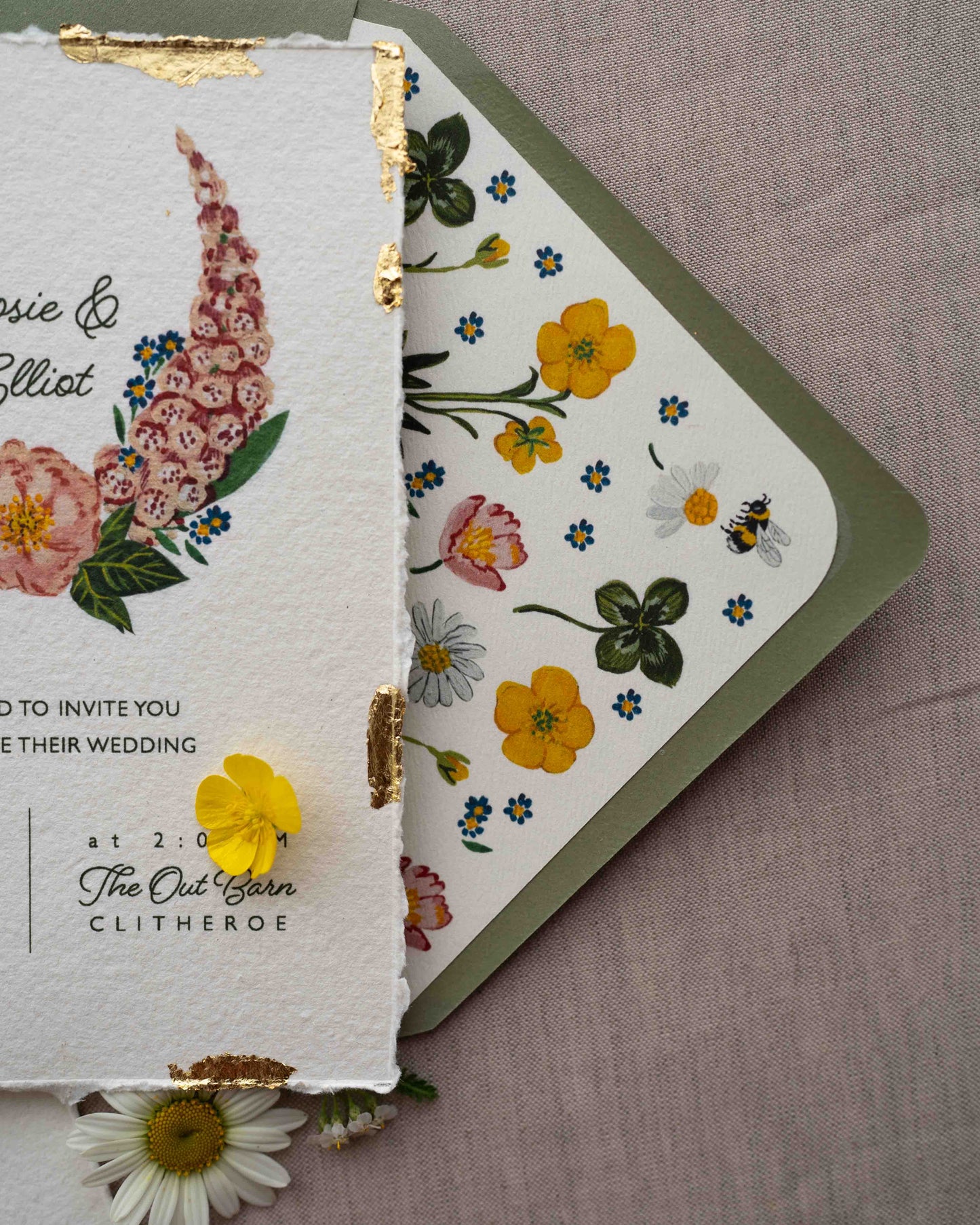 Close up of wild flower envelope liner, paired with sage green envelope.