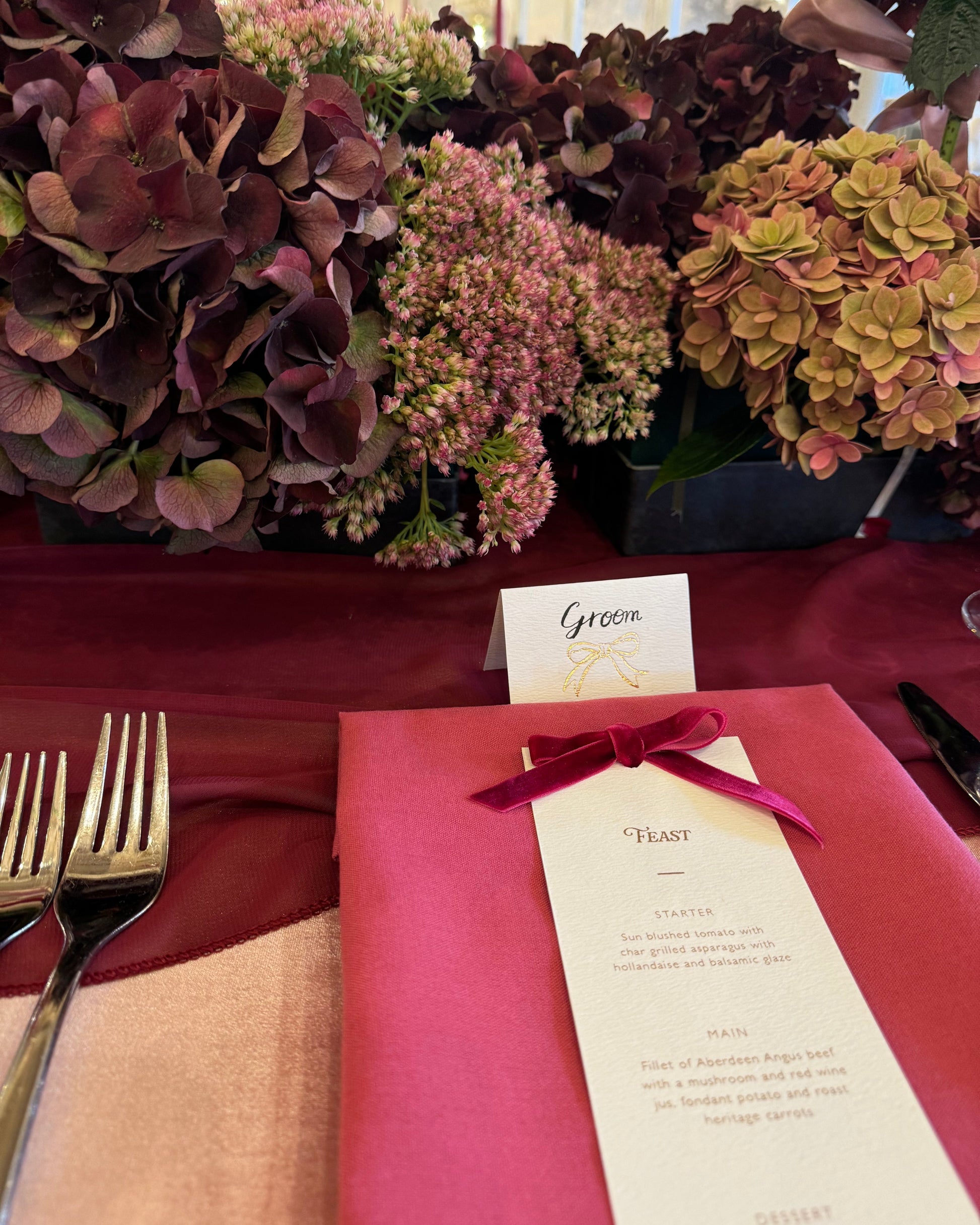 burgundy velvet bow wedding breakfast menu, calligraphy place card for the groom, fancy folk wedding stationery