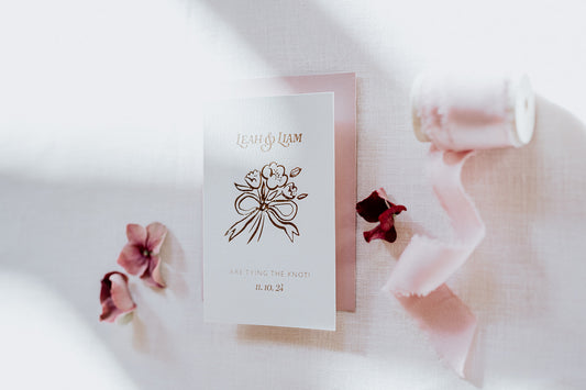 Bow Posy Wedding Save The Date Card with Dusty Pink envelope. Hot foil printed onto thick GFSmith Card