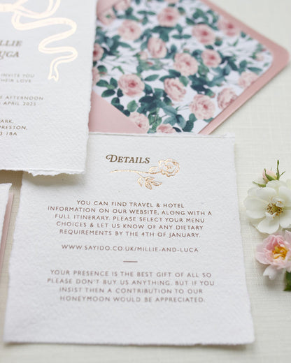 Rose Gold Wedding details card. Hot foil rose motif under the word " Details" printed onto la luxury handmade paper with romantic hand torn edges. Paired with Dusky pink envelopes and rose garden design envelope liners. Inspired by Bridgerton. 