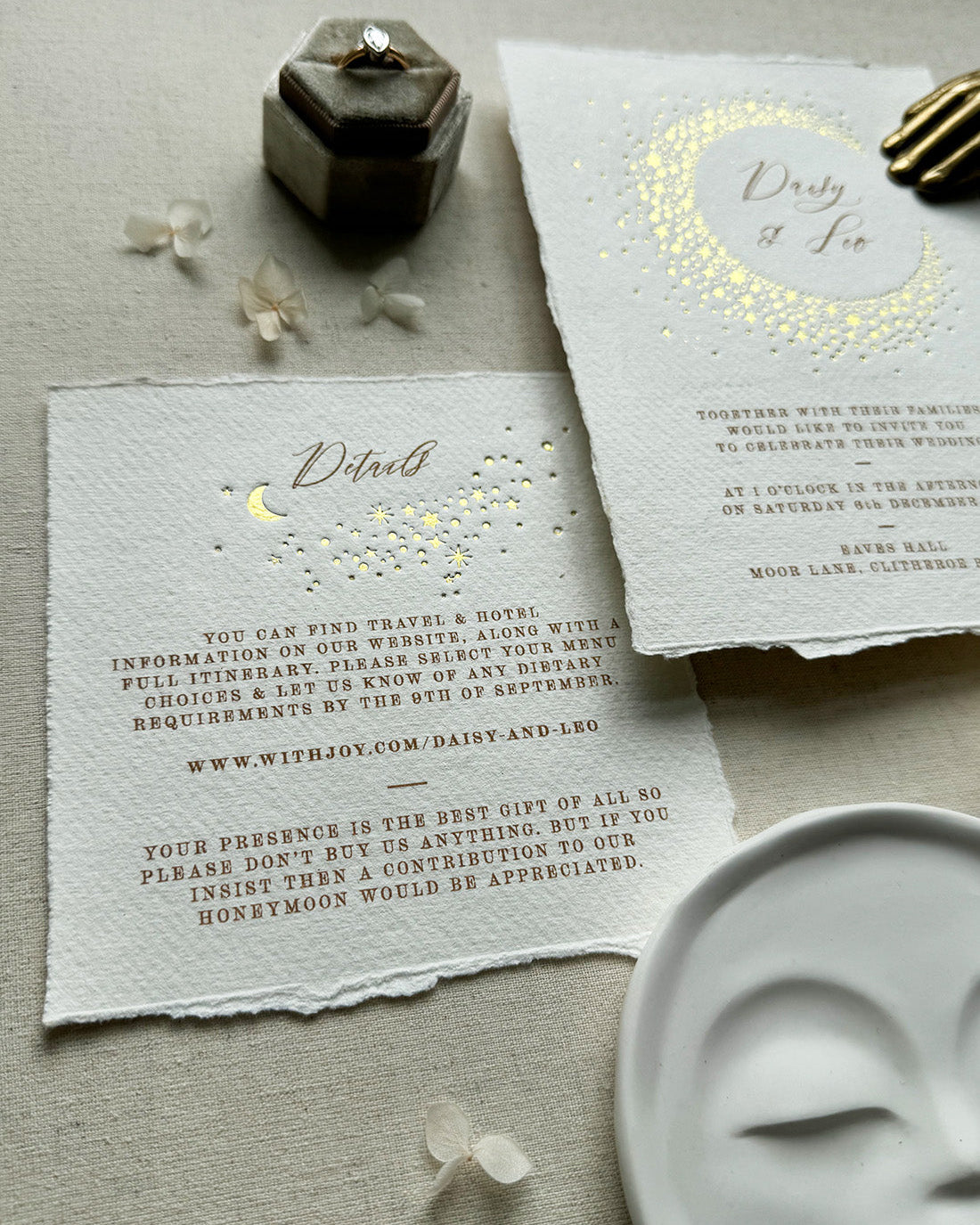 Celestial themed wedding details card. A truly magical scatter of little stars is hot foiled in gold on onto tactile handmade paper with a torn romantic edge. FancyFolk Design