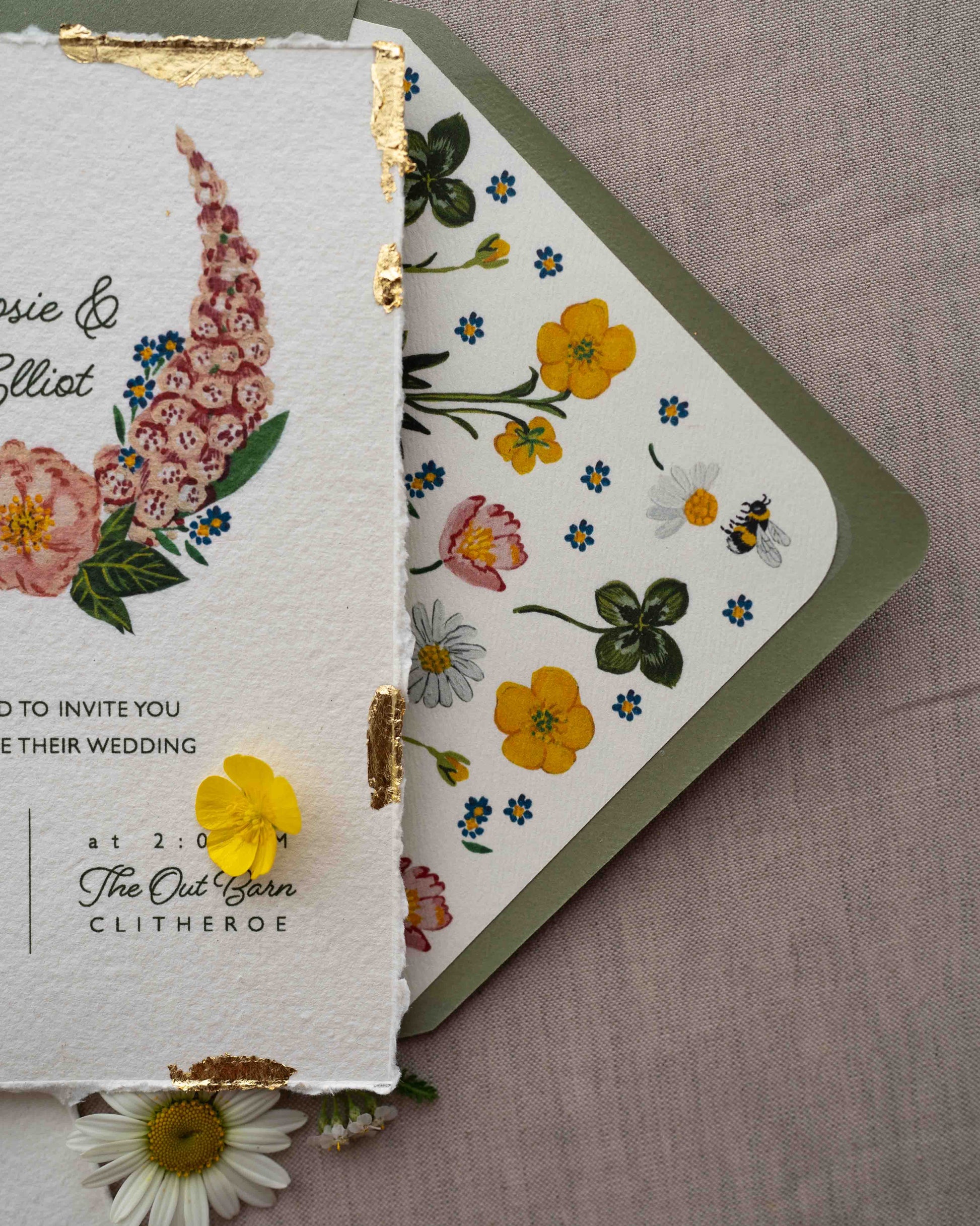 Close up of wild flower envelope liner, paired with sage green envelope. 