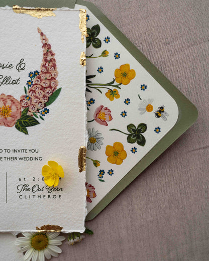 Close up of wild flower envelope liner, paired with sage green envelope. 