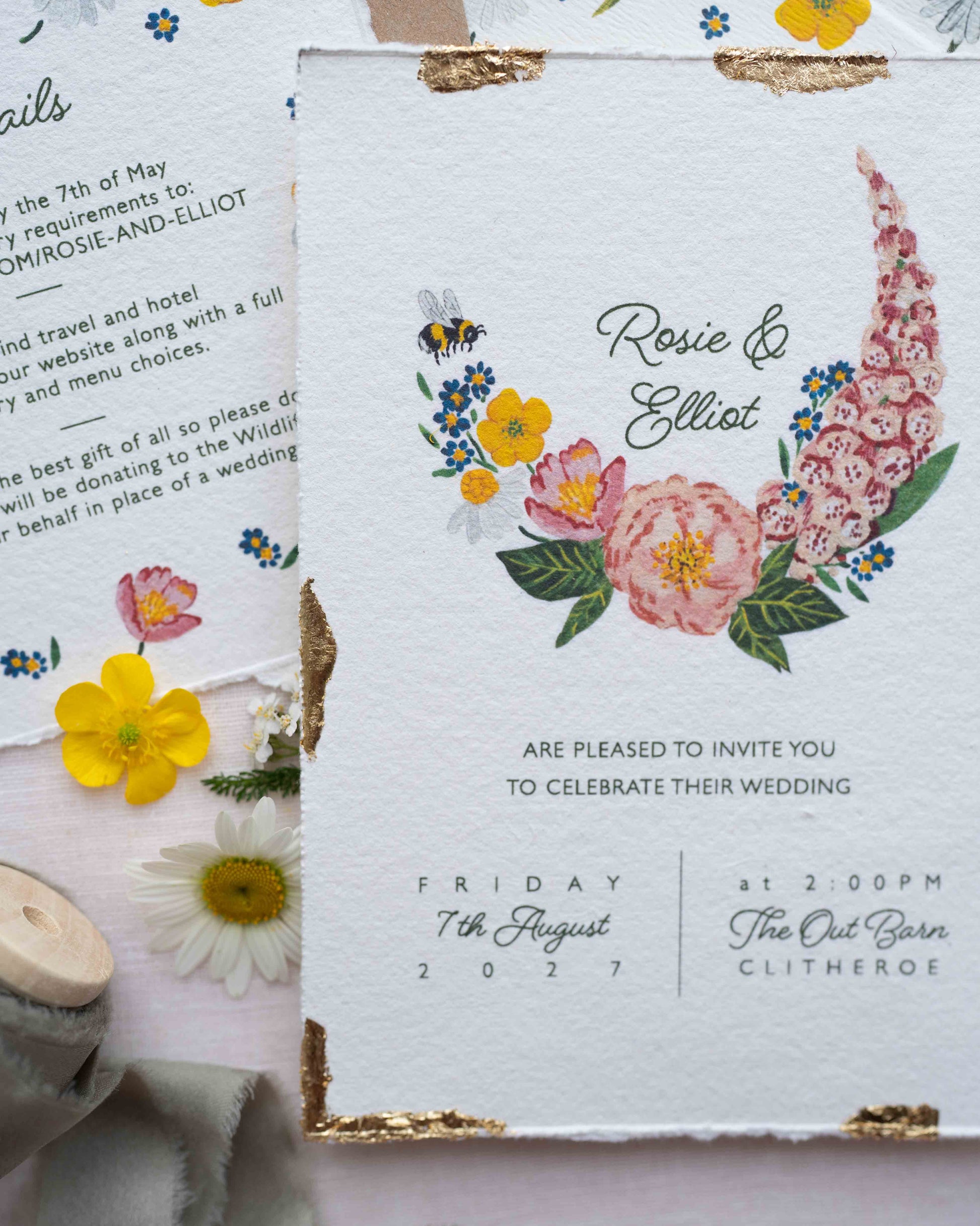 Watercolour hand painted florals of meadow flowers and a little bee make up a posy. Couples names are nestled in the floral. Printed on handmade Indian cotton paper with gold leaf accent. Fancy Folk Design